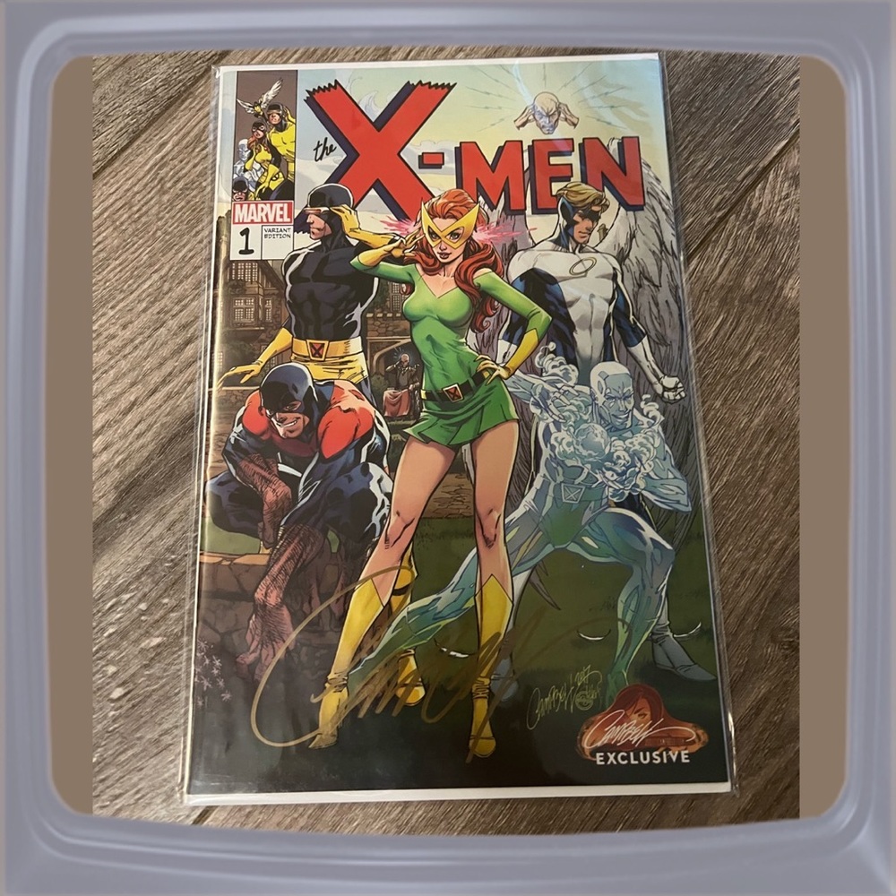 Marvel Comics X-Men Blue #1B,Signed Exclusive by J. Scott Campbell 1129/1500.